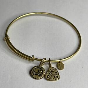 Chrysalis signed love stackable gold tone bracelet